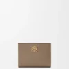 Anagram Compact Wallet in Pebble Grained Calfskin