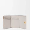 Anagram Small Vertical Wallet in Pebble Grained Calfskin